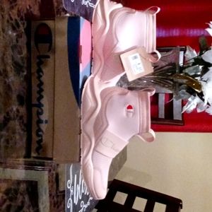 Brand new peachy colored Champion slip-ons